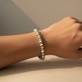 White Zen Bracelet worn on man's wrist