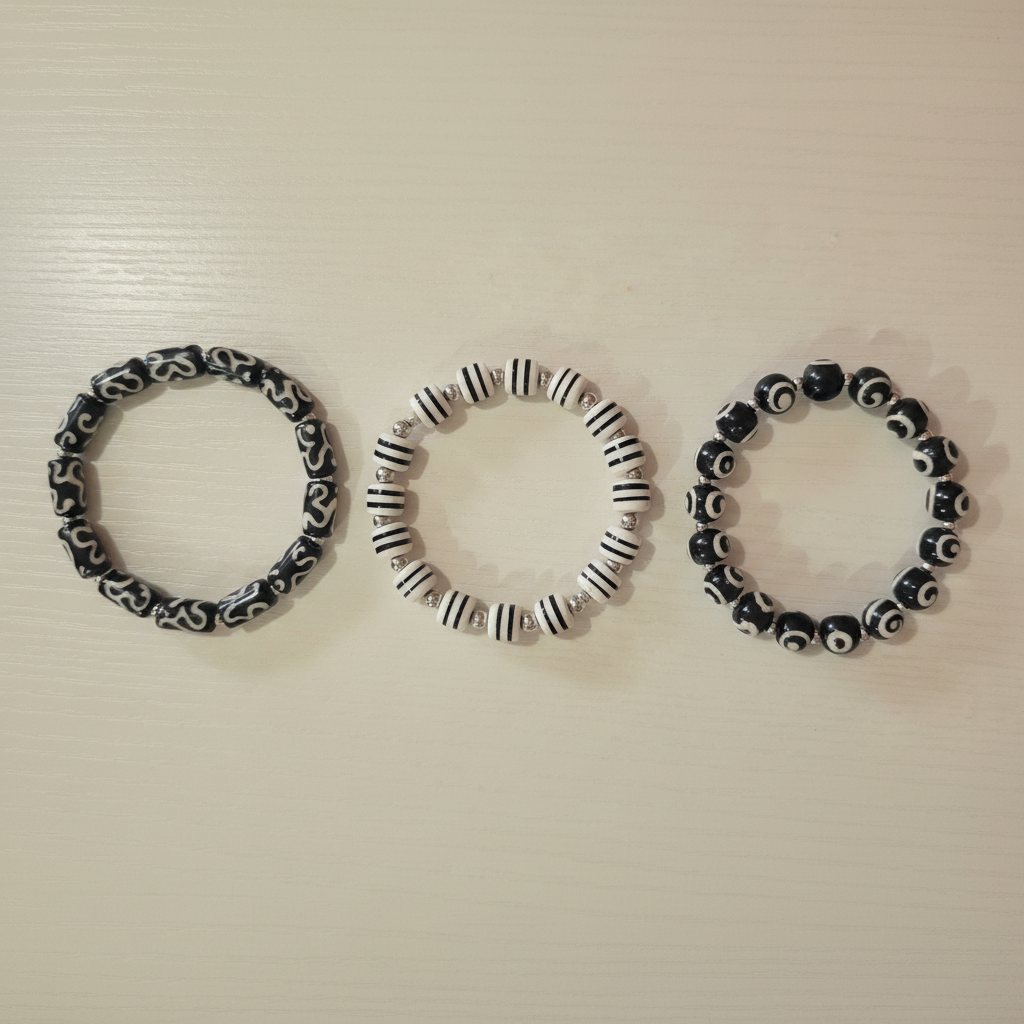 Stone Bracelet Stack flat lay on cream background