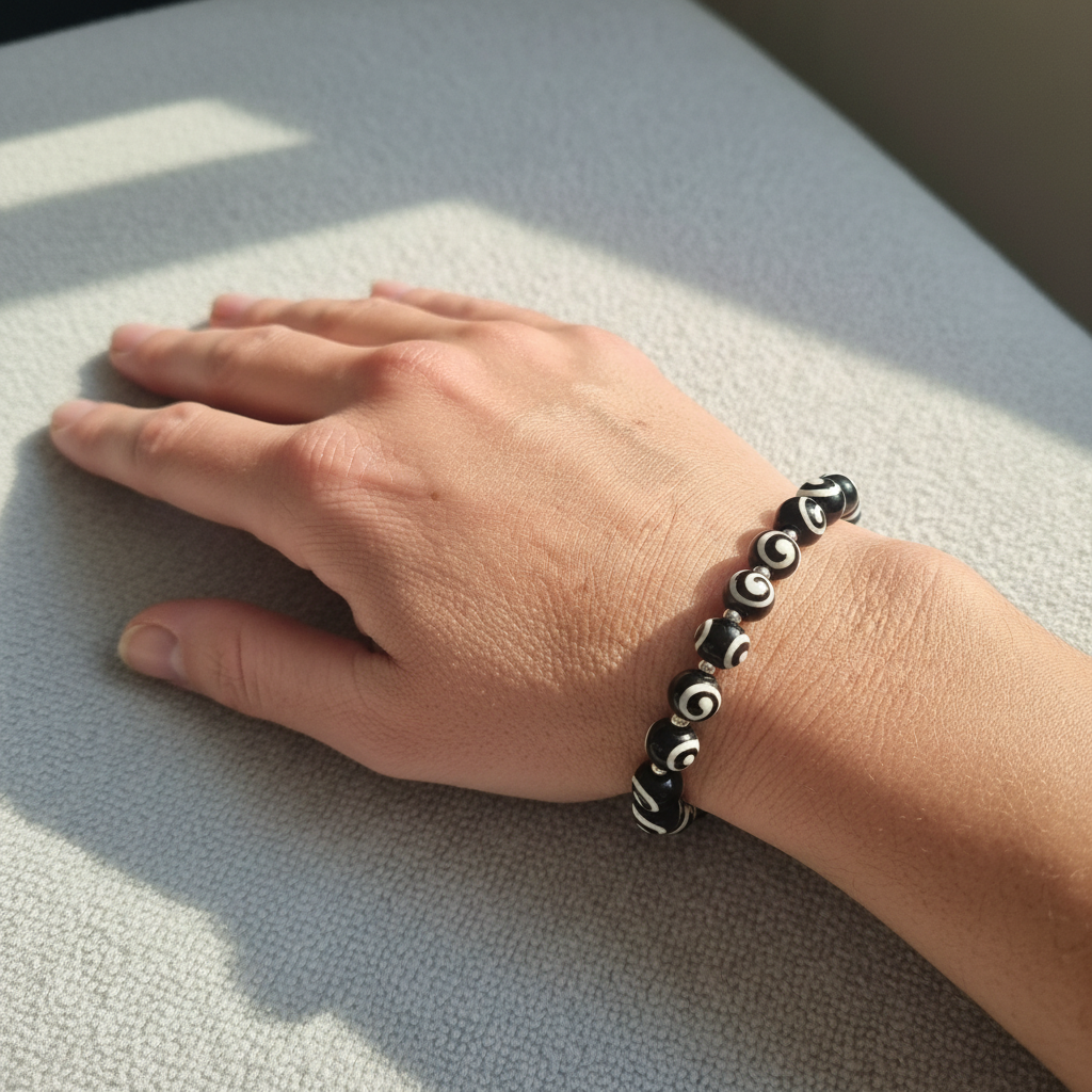 Midnight Swirl Bracelet worn on wrist